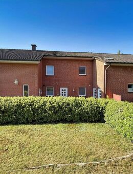 Attraktive Kapitalanlage in Hambühren: Mehrfamilienhaus mit 6 Wohneinheiten und 8 Garagen - Hambühren
