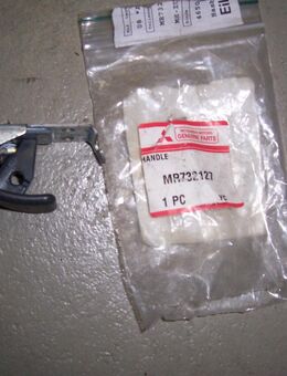 MR732127 Motorhaubenzuggriff grau Mitsubishi - Hannover Vahrenwald-List