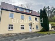 Großzügiges Anwesen mit Wohnhaus, diversen Fahrzeughallen und Gartengrundstück in Pfarrweisach - Pfarrweisach