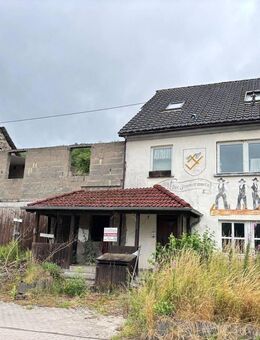 Zweifamilienhaus mit Einliegerwohnung und ein Rohbau in Deuselbach - Deuselbach