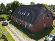 ruhig gelegenes solides Wohnhaus mit 3 Wohnungen und Doppelgarage - Almdorf