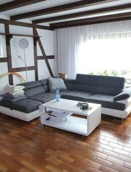 Attraktives Mehrfamilienhaus mit drei Wohneinheiten in Solms. - Solms