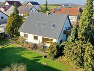 Einfamilienhaus mit Einliegerwohnung, großem Garten, Garage und Carport in ruhiger Lage - Schlaitdorf