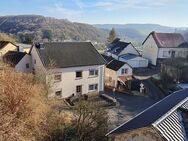 Familienhaus mit großem Inneren und kleinem Garten in ruhiger Lage. - Bettingen