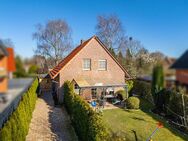 Charmantes Einfamilienhaus mit Kamin, Fußbodenheizung & Garten - zentrale Lage, top Zustand - Aurich