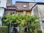 gemütliches Reihenmittelhaus in Heiligenwald mit schönem Garten - Schiffweiler