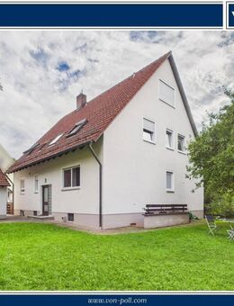 Charmantes Zweifamilienhaus mit großem Garten und vielfältigem Ausbaupotenzial in Barthelmesaurach - Kammerstein