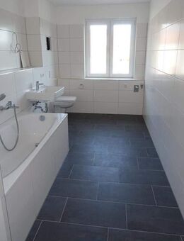 Modern ausgestattete 4-Zimmer-Familienwohnung mit Balkon und Fußbodenheizung! - Coswig