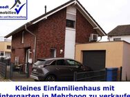 Kleines freistehendes Einfamilienhaus mit Wintergarten zentral in Hamminkeln-Mehrhoog zu verkaufen - Hamminkeln