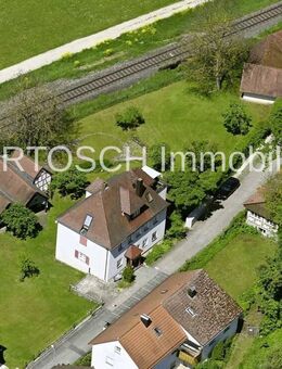 Vermietetes Mehrfamilienhaus mit 3 Wohneinheiten, vermieteten Garagen und zusätzlichen Baugrund - Ebermannstadt