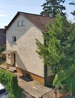Großzügiges Einfamilienhaus mit Garten und Nebengebäuden - viel Potenzial für Sanierungsprofis! - Kronau