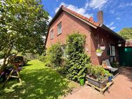 EIN-/ZWEIFAMILIENHAUS MIT WINTERGARTEN UND GARAGE IM ERHOLUNGSGEBIET TIMMEL - Großefehn