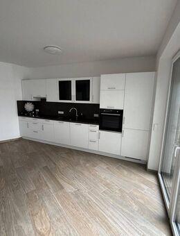 Komfortable 2-Zimmer-DG-Wohnung mit moderner Einbauküche und Balkon - Lohne (Oldenburg)