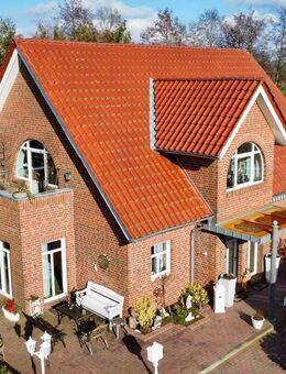 Vermietetes Zweifamilienhaus mit solider Rendite in ruhiger Lage - Saterland