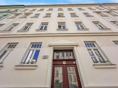 Gepflegte 3-Zimmer-Wohnung mit Parkett, Balkon und Gartenanteil in ruhiger Seitenstraße