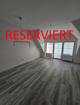 RESERVIERT: Helle 3-Zimmer Dachgeschoss-Wohnung mit Balkon und Tiefgaragenplatz zu verkaufen - Gottmadingen