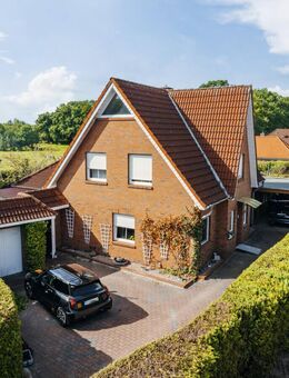 **Wohnen im Grünen: Gepflegtes Einfamilienhaus mit Garten, Terrasse und Platz für die Familie** - Rhauderfehn