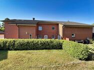 Attraktive Kapitalanlage in Hambühren: Mehrfamilienhaus mit 6 Wohneinheiten und 8 Garagen - Hambühren