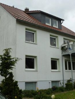 Modernisiertes Zweifamilienhaus mit Wintergarten - Halle (Landkreis Holzminden)