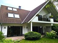 Erdgeschoss-Eigentumswohnung mit Terrasse, Garten und Tiefgaragenplatz - Krefeld