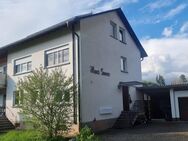 Attraktive Kapitalanlage - Teilsaniertes MFH mit 4 Whg. in grenznaher Lage mit großem Grundstück - Küssaberg