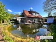 Exklusives Einfamilienhaus mit Naturschwimmteich in Varel-Obenstrohe (Obj.-Nr. 6505) - Varel