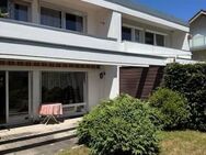 Brück Immobilien - Charmantes 5 Zi.-Reihenmittelhaus mit Süd-Terrasse und Garten - Unterhaching