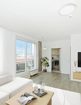 Lichtdurchflutete Maisonette mit sonniger Dachterrasse - München