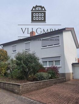 Zweifamilienhaus in St. Ingbert-Hassel - gepflegtes Wohnhaus mit großem Garten und flexibler Nutzung - Sankt Ingbert