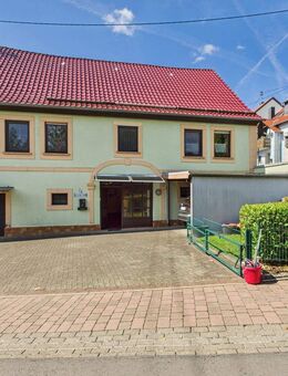 Gemütliche Doppelhaushälfte mit Garten und vielseitigen Nutzungsmöglichkeiten - Rückweiler