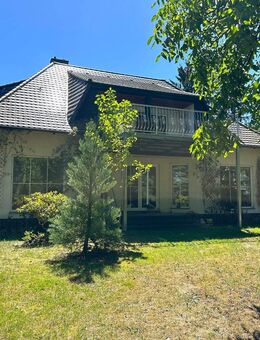 Einfamilienhaus mit großem Grundstück, einzigartigem Seeblick und optionalem Bootshaus - Göhren-Lebbin