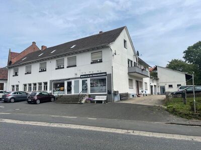 Mehrfamilienhaus mit fünf Wohn- und zwei Gewerbeeinheiten auf ca. 2.621m² Grundstück in Wabern-Hebel