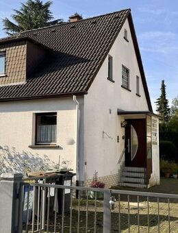 METZ IMMOBILIEN - Charmante Doppelhaushälfte mit großem Potenzial in familienfreundlicher Lage! - Frankfurt (Main)