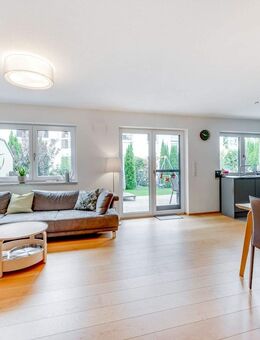 AIGNER - Moderne Gartenwohnung auf zwei Etagen mit Südterrasse und eigenem Garten - Oberding