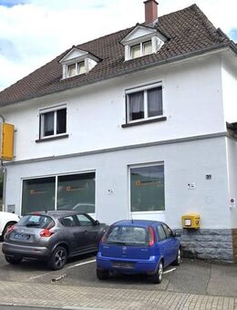 Charmante Dreizimmerwohnung mit Entwicklungsmöglichkeiten und geringem Renovierungsbedarf. - Eberbach