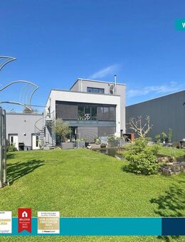 Schweich-Issel: Modernes Einfamilienhaus mit angeschlossener Lager-/Produktionshalle - Schweich