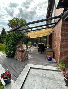 Einfamilienhaus mit großem Schwimmteich und Garten in Friedrichsfehn, optionales Baugrundstück - Edewecht