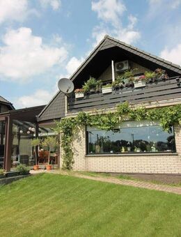 Bungalow mit großem Wintergarten und Einliegerwohnung im Dachgeschoss, Rheinberg-Ossenberg, mit großem Garten - Rheinberg