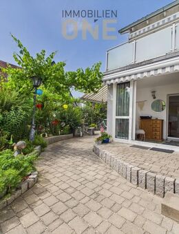 Zur Selbstnutzung oder Kapitalanlage! Helle 2,5-Zimmer-Erdgeschosswohnung mit Einliegerwohnung und Südgarten - Regensburg