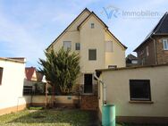 Freistehendes Einfamilienhaus in Bischofsheim zum Verkauf mit Garage und Garten - Bischofsheim