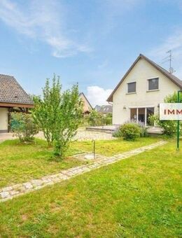 IMMOBERLIN.DE - Ansprechendes Haus mit Westgarten & Garage in harmonischer Lage - Luckenwalde