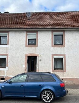 vermietetes Reihenmittelhaus mit großem Grundstück in Wadern-Lockweiler - Wadern