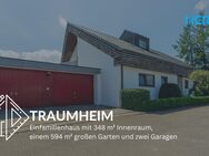 TRAUMHEIM - Einfamilienhaus mit 348 m² Innenraum, einem 594 m² großen Garten und zwei Garagen - Auenwald