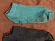 Verschieden farbige Socken - Gotha