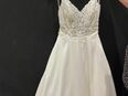 Neu und ungetragenes Brautkleid mit Satin und Spitze zu verkaufen in 51491