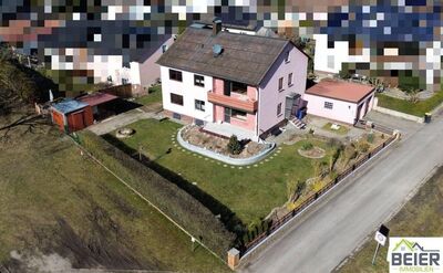 Zweifamilienhaus mit Ausbaupotential in naturnaher Lage