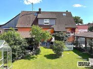 Grünes Wohnglück mit Dachterrasse - Einfamilienhaus mit Kaminofen & Garten - Burgau