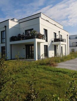 Exquisite Eigentumswohnung in hervorragender Ausführung mit Einbauküche, 2 Terrassen und Stellplatz - Otterndorf