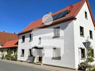 Modernisiertes Einfamilienhaus mit umfangreichen Nutzflächen und separatem Garten - Hammelburg