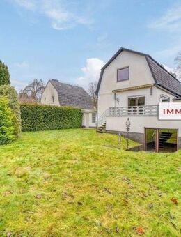IMMOBERLIN.DE - Fabelhaftes Haus mit Westterrasse, Gestaltungspotenzial & Doppelgarage in naturverbundener Lage - Berlin